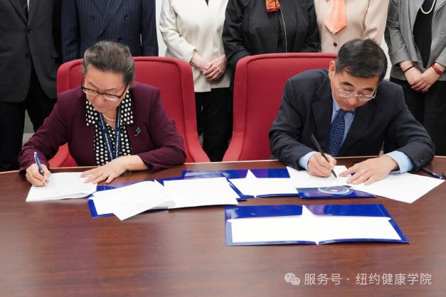 Representatives signing the memorandum of understanding at New York College of Health Professions