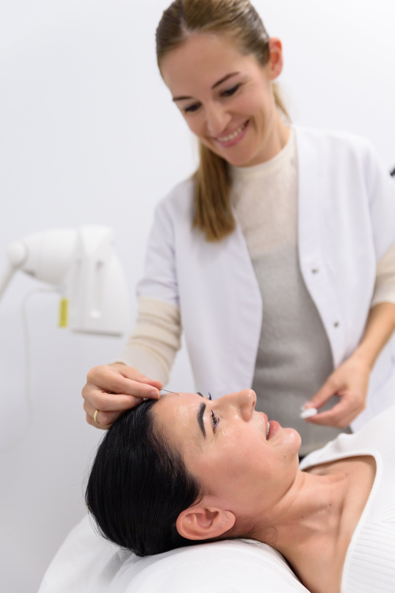 A patient receiving acupuncture treatment